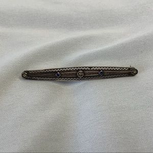 Vintage brooch with diamonds and blue sapphires